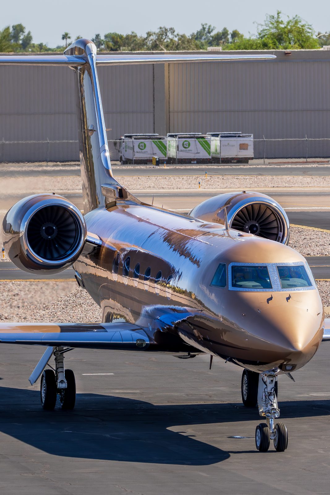 Gulfstream G450 business jet on the ramp at Scottsdale, viewed from behind the wing.